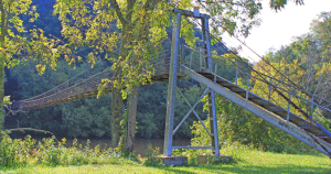 Swinging Bridge Across the Holston River, reportedly where Daniel Boone and his 30 axemen forded the Holston on their way to the Cumberland Gap. The original John Anderson Blockhouse was just up the road.